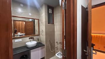 Shower, free toiletries, towels, soap