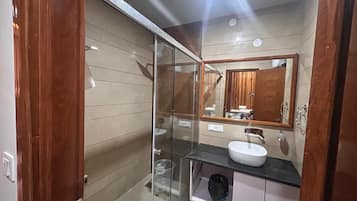Shower, free toiletries, towels, soap