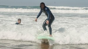 A person surfing in the ocean. - Epicswellhouse (Aourir)