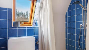 Shower, hair dryer, towels, toilet paper