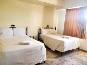 Deluxe Double Room | Bed sheets - Hotel Tropicana (Santo Domingo Este)