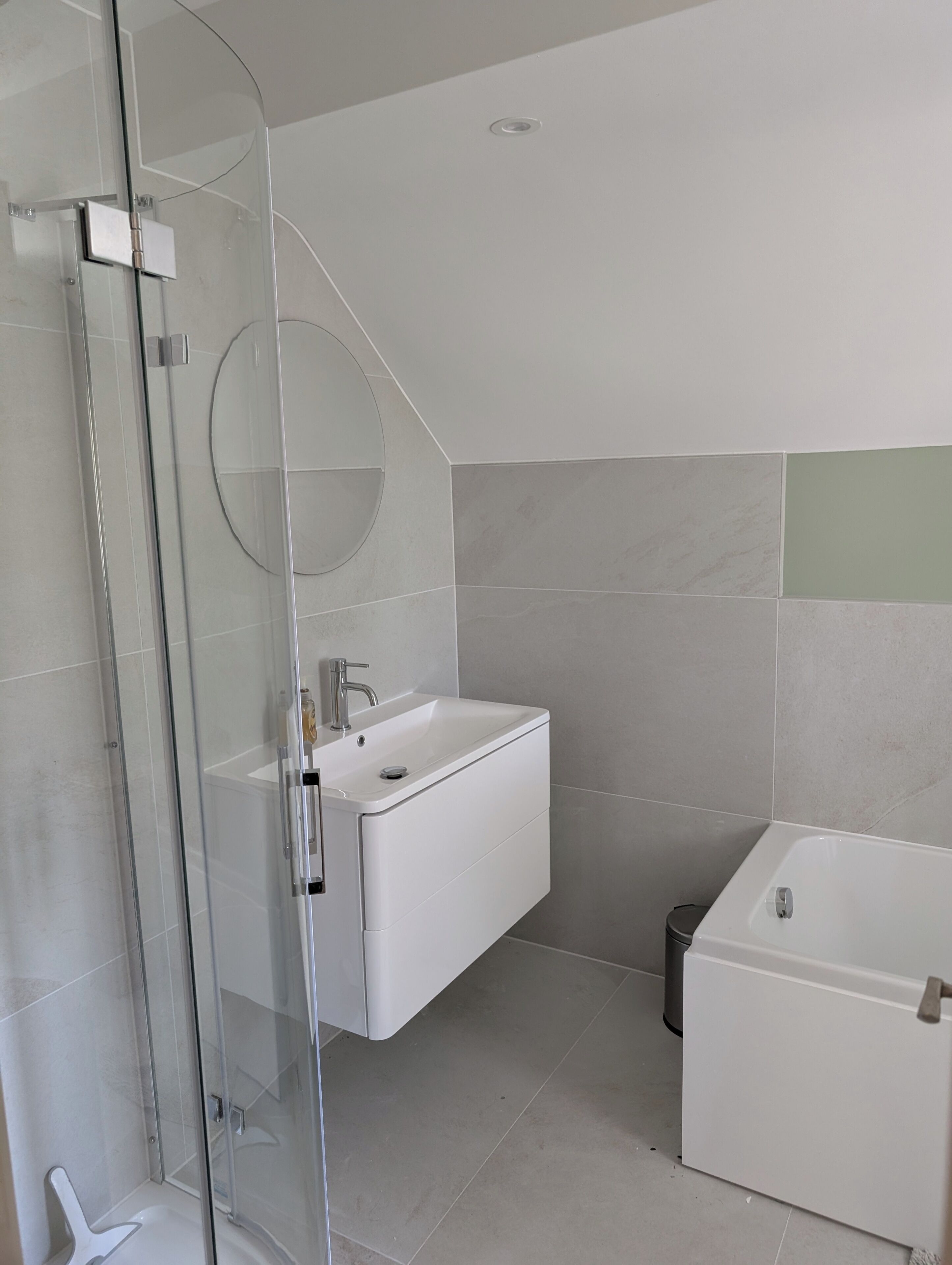 Shower, hair dryer, towels, toilet paper