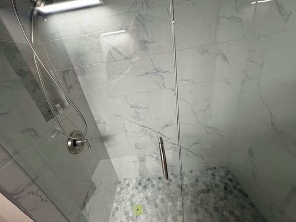 Shower, hair dryer, towels, soap