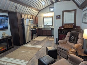 TV, fireplace - Gerrie's Place at Figment Llama Ranch Foundation  -  Near Round Top TX (New Ulm)