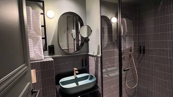 Shower, free toiletries, hair dryer, slippers