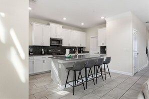 Fridge, microwave, oven, coffee/tea maker - 5BR Resort Home w/ Private Pool Near Disney (Kissimmee)
