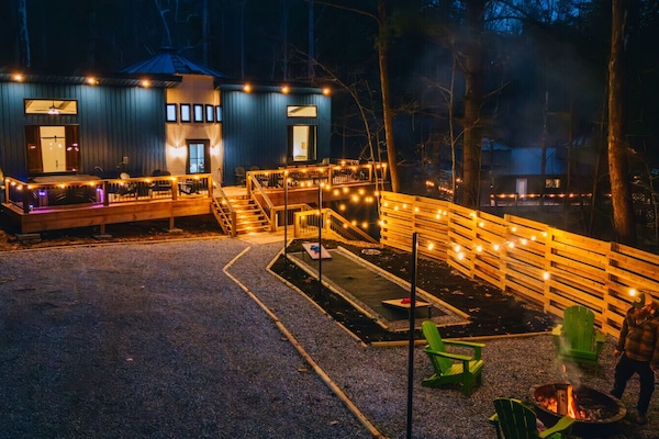 Welcome to The Derby by The Hideaways! As the sun goes down, the string lights come on. Gather around our custom fire pit for an unforgettable evening under the stars.