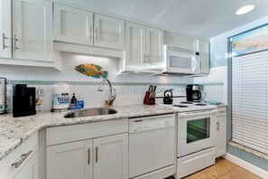 Coffee/tea maker, fridge, microwave, oven