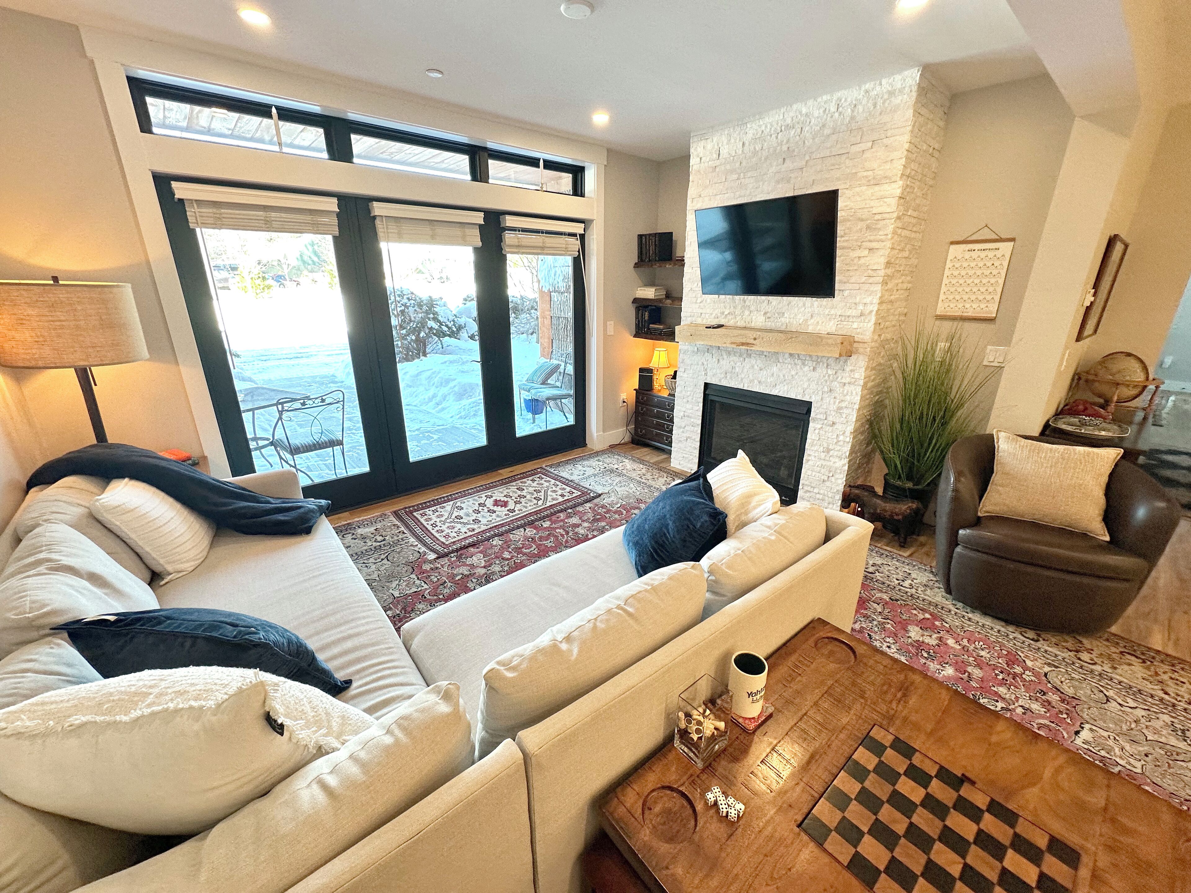 Smart TV, fireplace, books