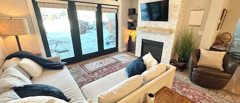 Smart TV, fireplace, books