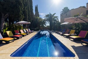 Outdoor pool, open 8:00 AM to 8:00 PM, pool umbrellas, pool loungers