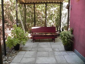 Standard Quadruple Room | Terrace/patio - Pousada Éden (Colinas do Sul)