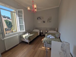 2 bedrooms, desk, iron/ironing board, travel crib