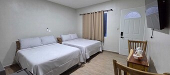 Cozy 1-bedroom with two queen bed lodge La Posada Cruz in enchanting Nahuizalco.