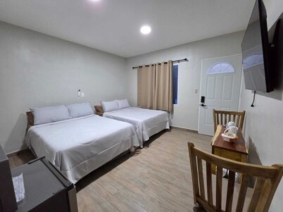 Cozy 1-bedroom with two queen bed lodge La Posada Cruz in enchanting Nahuizalco.