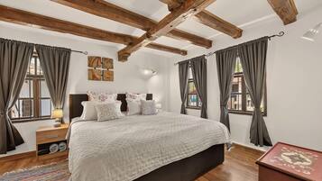 2 habitaciones, tabla de planchar con plancha y cuna de viaje