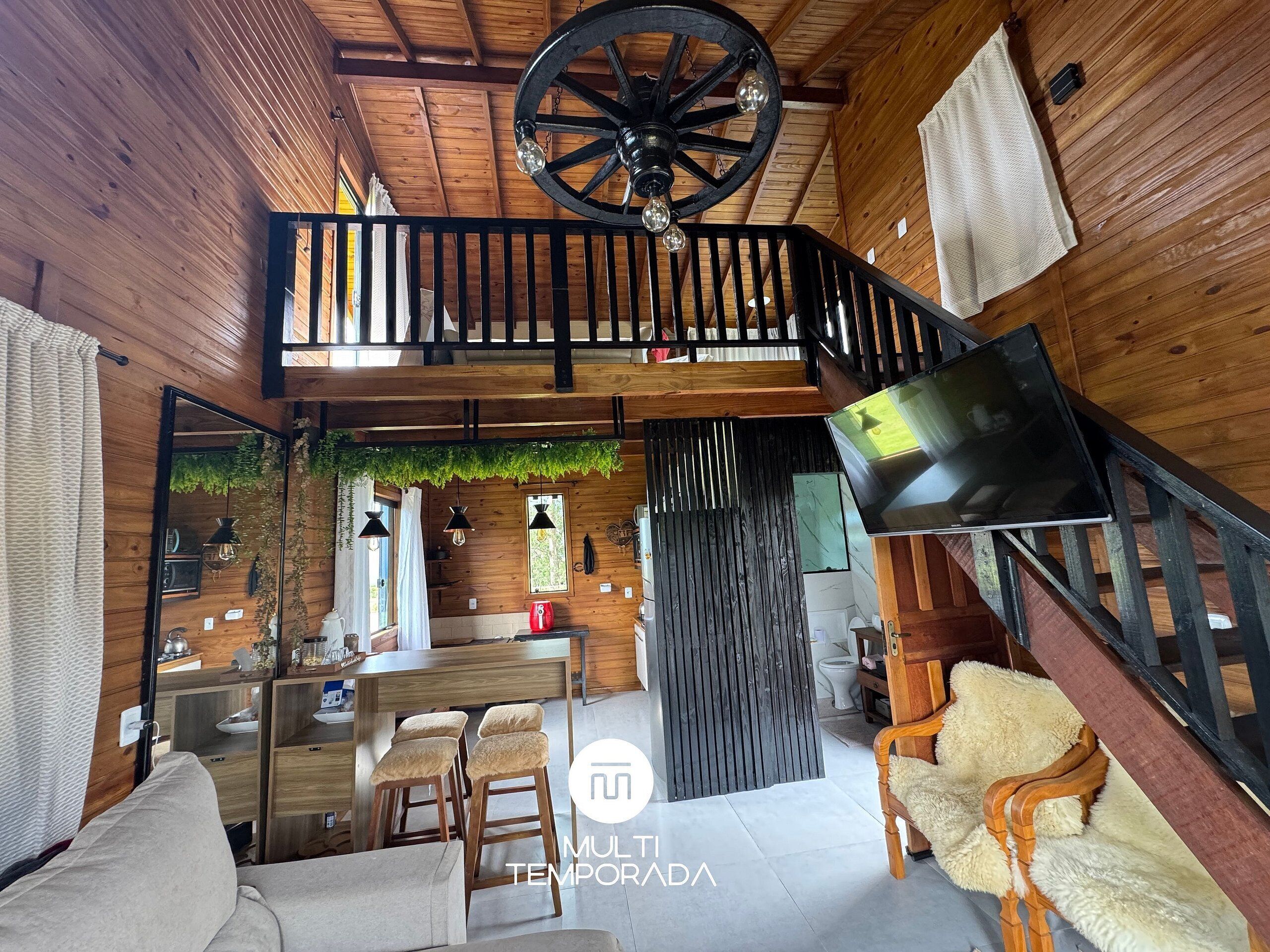Deluxe Chalet, Jetted Tub, Mountain View | Living area | 40-inch TV with digital channels, fireplace