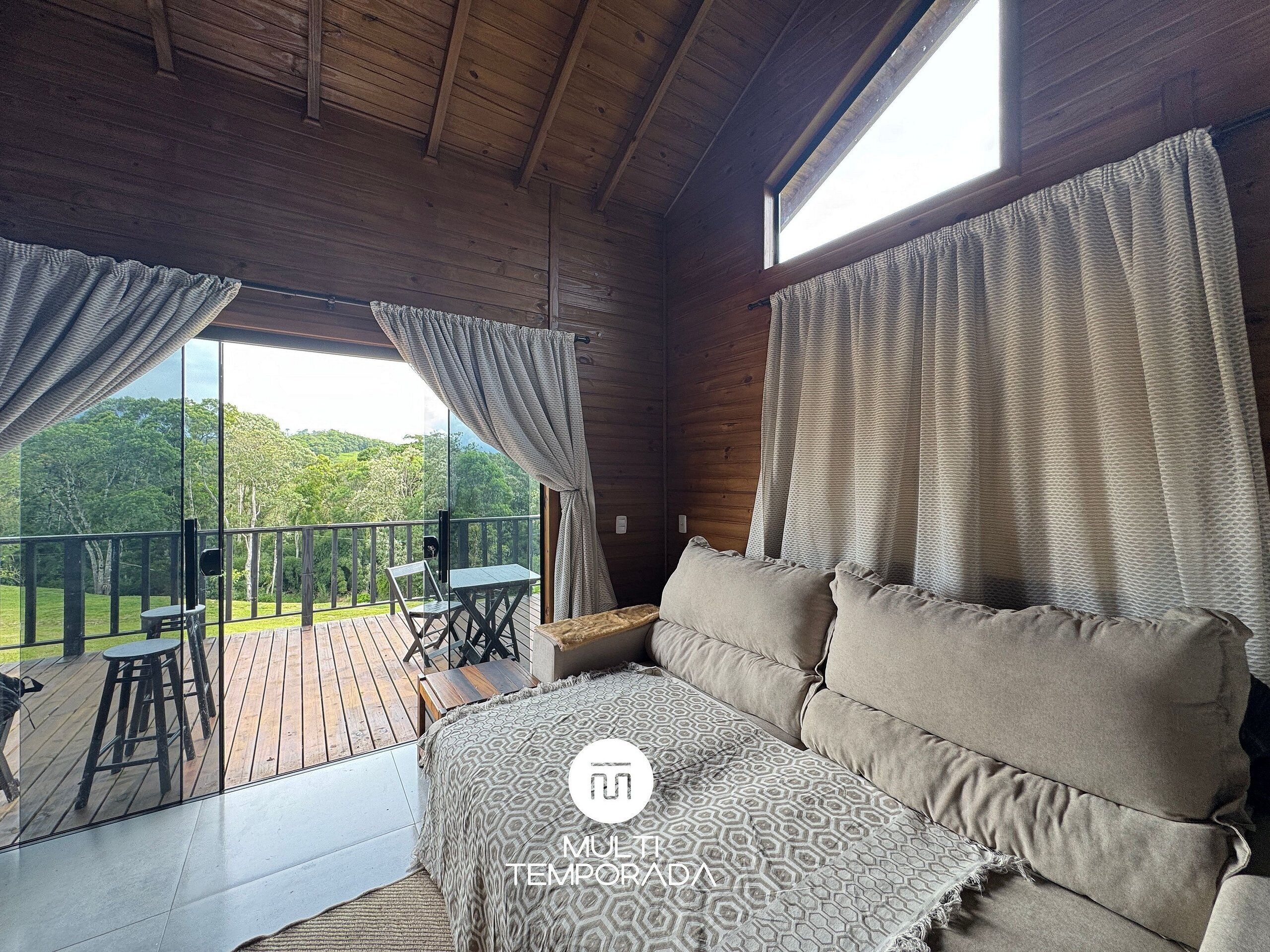 Deluxe Chalet, Jetted Tub, Mountain View | Living area | 40-inch TV with digital channels