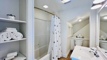 Hair dryer, towels, soap, shampoo