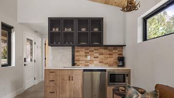 Microwave, coffee/tea maker, toaster, cookware/dishes/utensils