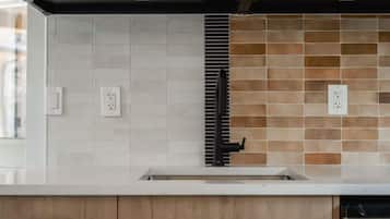 Microwave, coffee/tea maker, toaster, cookware/dishes/utensils