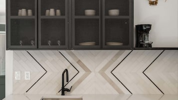 Microwave, coffee/tea maker, toaster, cookware/dishes/utensils