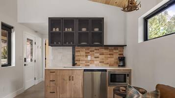 Microwave, coffee/tea maker, toaster, cookware/dishes/utensils