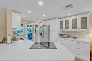 Fridge, microwave, stovetop, dishwasher - Lake by the Beach by Duncan Real Estate (Holmes Beach)