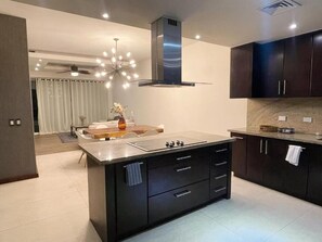 Private kitchen - Beachfront Apartment (El Centenario)