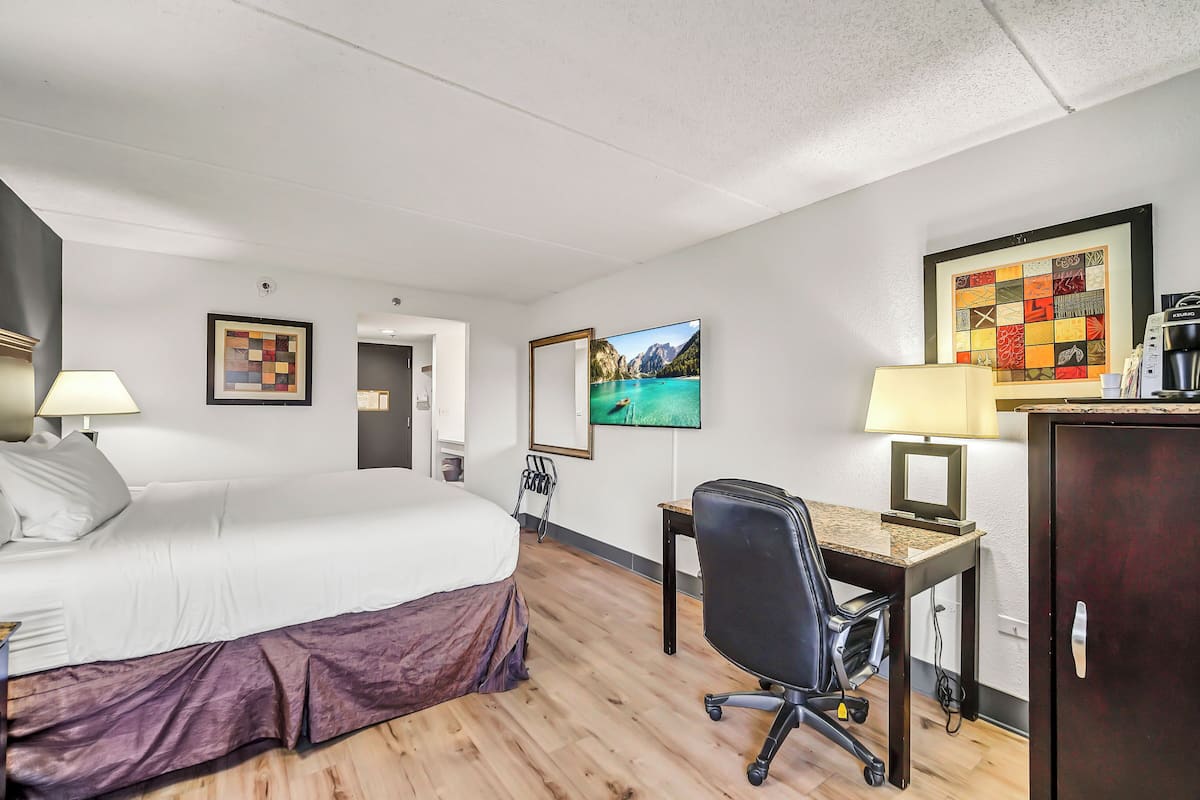 In-room safe, desk, laptop workspace, blackout curtains