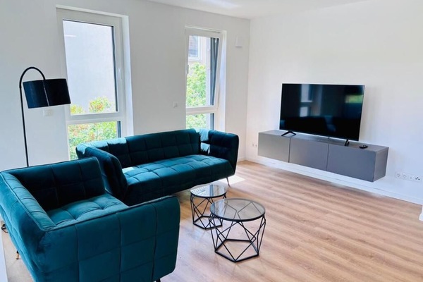 Comfort Apartment, Balcony, City View | Living area | Flat-screen TV