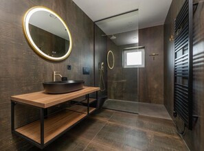 Shower, hair dryer, towels, toilet paper