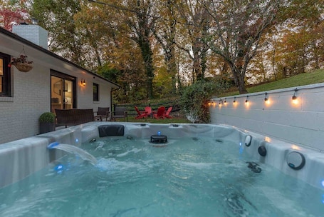 Outdoor spa tub. Hot Tub + Fire Pit Near Asheville & Biltmore