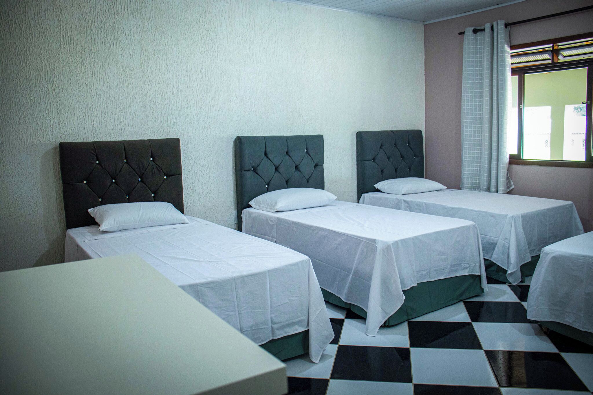 Quarto quádruplo, vista para o jardim | Spa