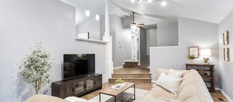 Two Living Spaces • Private Downstairs Suite