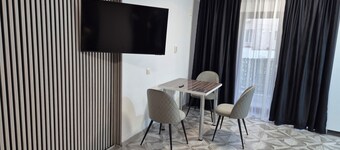 Lovely 1-bedroom apartment with AC in charming Târgu Jiu
Elegant Central Studio