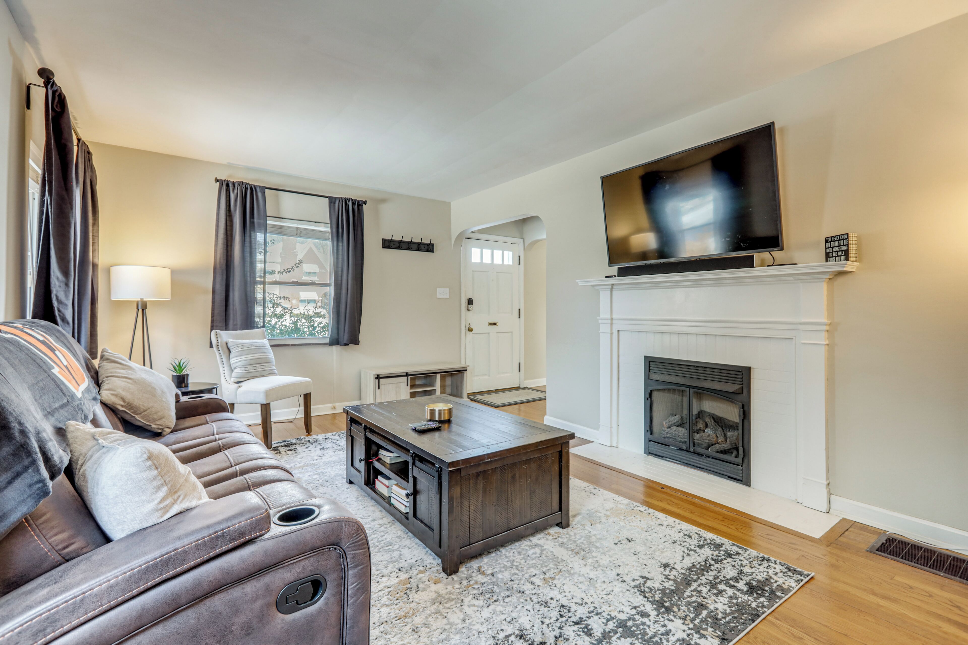 TV, fireplace, books