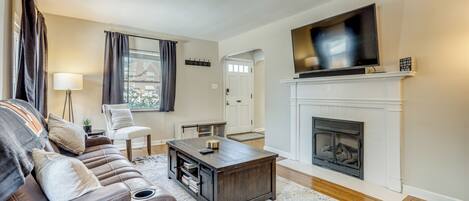 TV, fireplace, books