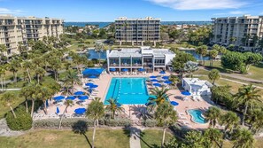 Resort-style pool and lounge area with ocean views - Beachplace 8-305 by FGC (Longboat Key)