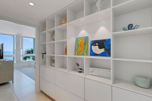 Bright hallway with custom built-in shelving and ocean views - Beachplace 8-305 by FGC (Longboat Key)