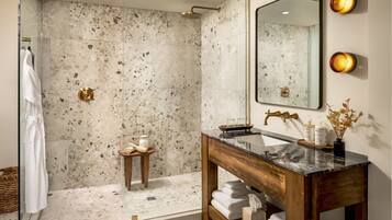 Signature Suite, 1 King Bed | Bathroom | Shower, designer toiletries, hair dryer, bathrobes