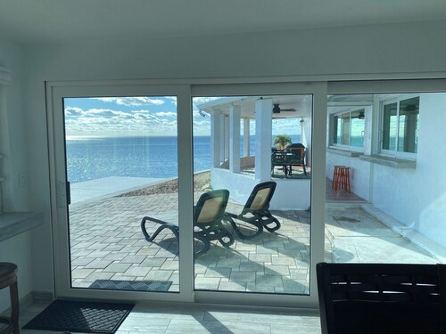 One story home on the Gulf. Sunsets all year long. Dolphins visit daily.