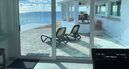 One story home on the Gulf. Sunsets all year long. Dolphins visit daily.