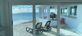 One story home on the Gulf. Sunsets all year long. Dolphins visit daily.