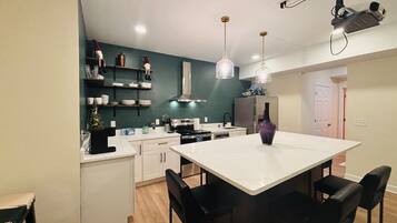 Coffee/tea maker, fridge, microwave, oven