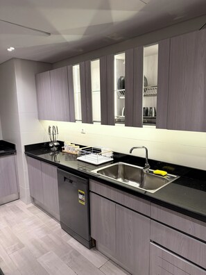 Private kitchen - Charming 2BR In Cairo Festival City (Cairo Governorate)
