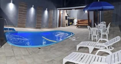 Vacation home with pool in Matinhos/Paraná. Near the concert arena