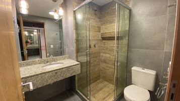 Shower, towels, toilet paper