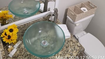 Hair dryer, towels, soap, shampoo