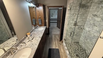 Shower, towels, soap, toilet paper